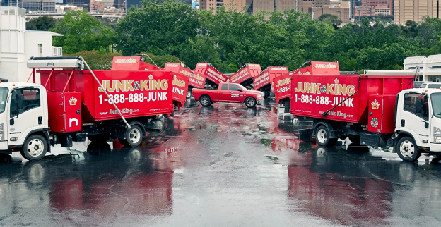 Professional junk trucks parked side by side.