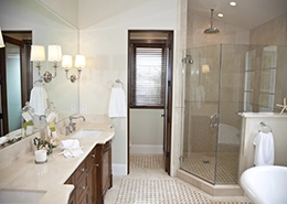 Glass bathroom light fixture mounted above the sink.