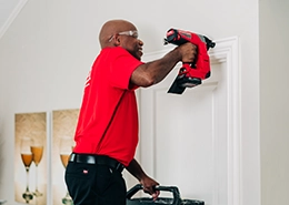 MRH technician installing door molding.