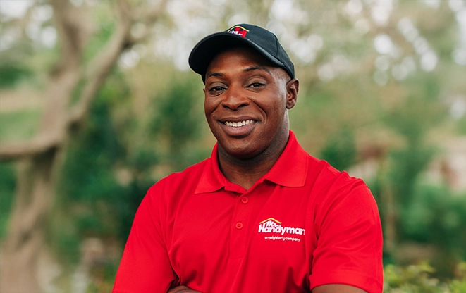MRH technician standing outside a home.