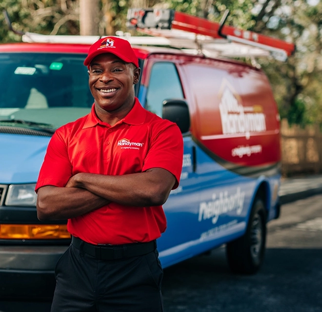 MRH technician standing beside a service van.
