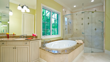 High end bathroom painted muted yellow.