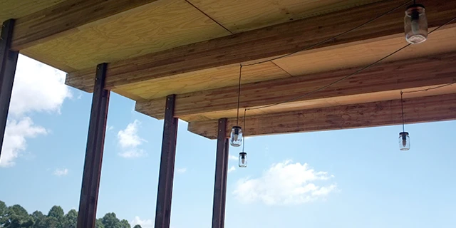 Roof rafter with hanging bulbs.