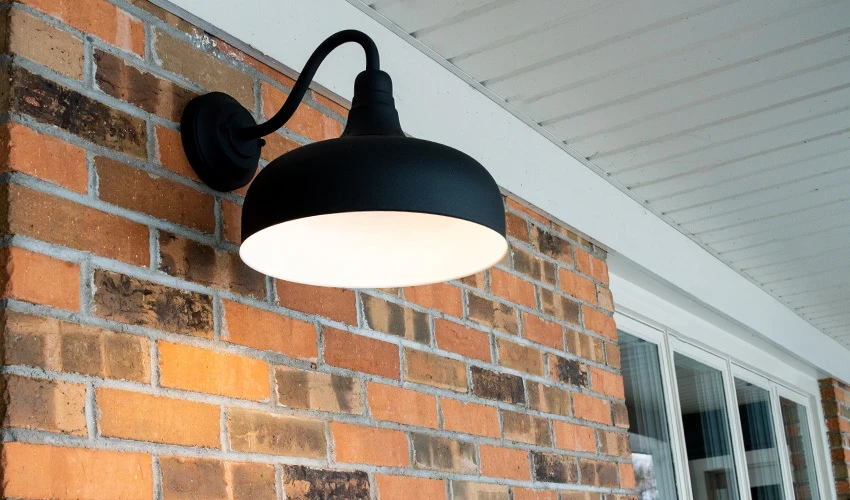 Black lamp on the exterior of a home.