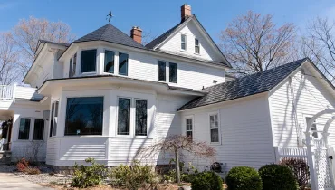 Large white historic home.