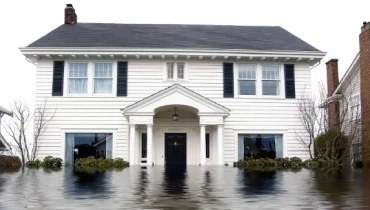 Exterior of home in a flood.