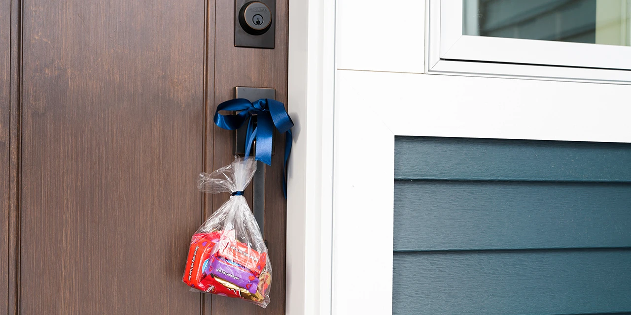 Bag of candy hanging from a doorknob