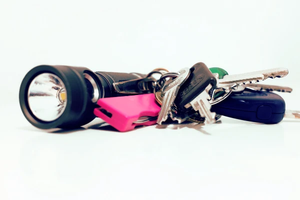 Keychain gadgets including flashlight and keys