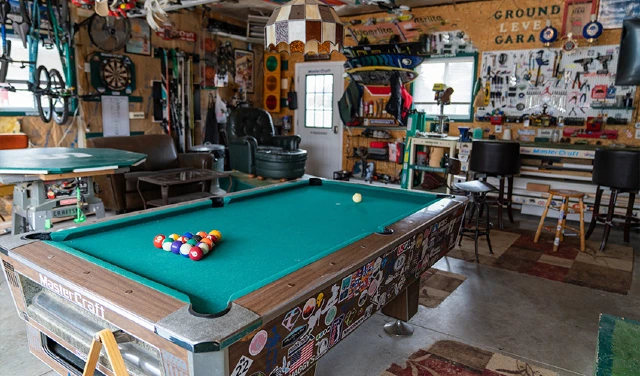 Man cave with pool table.
