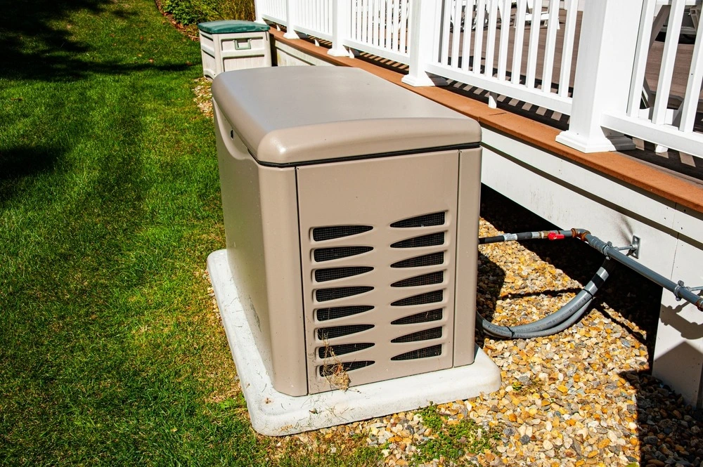 Backup generator outside of house and deck.