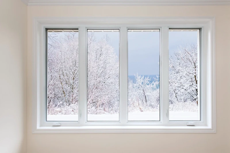 4 long windows with winter scene outside.