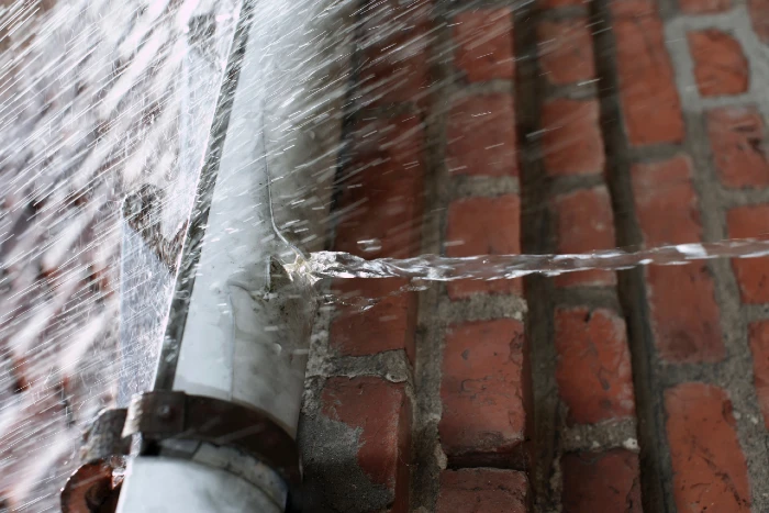 Rain falling into gutters