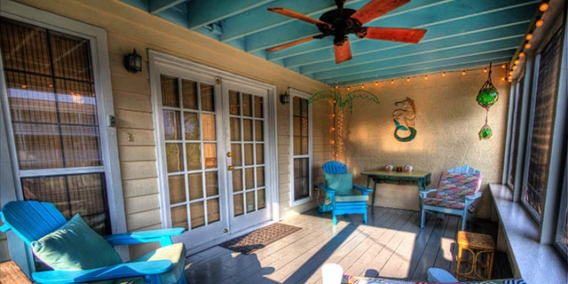 Covered patio with beach themed decor.