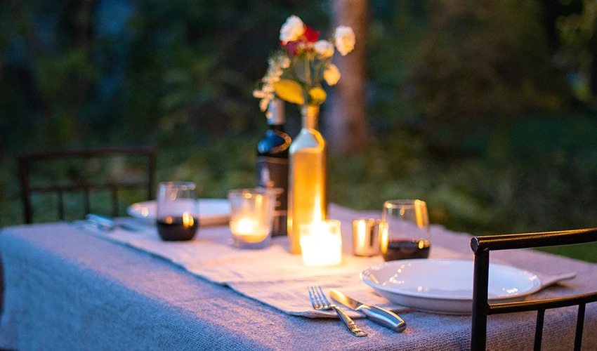 table set up for candle light dinner