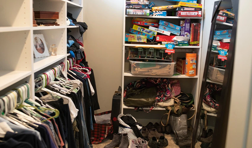 cluttered closet that needs organized