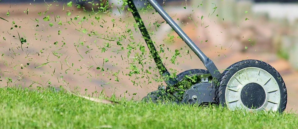 Lawn mowing with a reel lawn mower