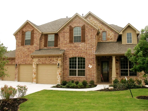 large brick two story home