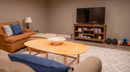 Finished basement furniture and TV.