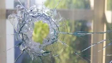 A cracked home window.