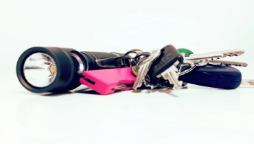 Keychain gadgets including flashlight and keys