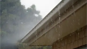 Raining on a roof.