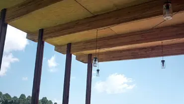 Roof rafter with hanging bulbs.