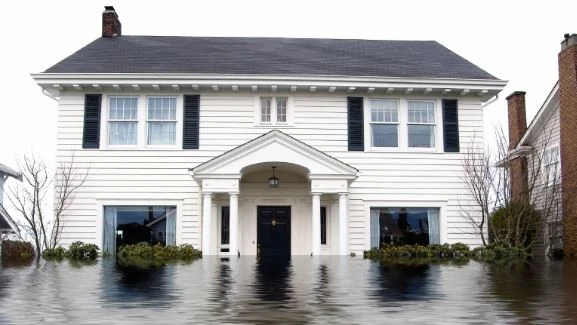 Exterior of home in a flood.